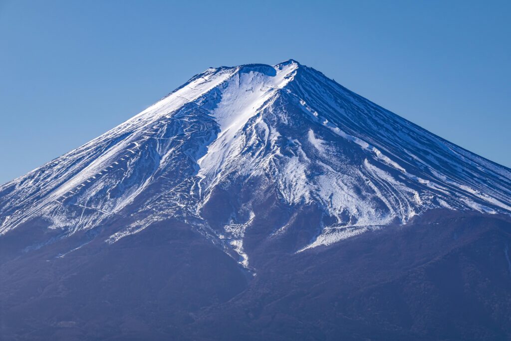 pexels-photo-35663479-35663479 Stunning view of Mount Fuji with snow, captured on a clear day in Fujiyoshida, Japan.